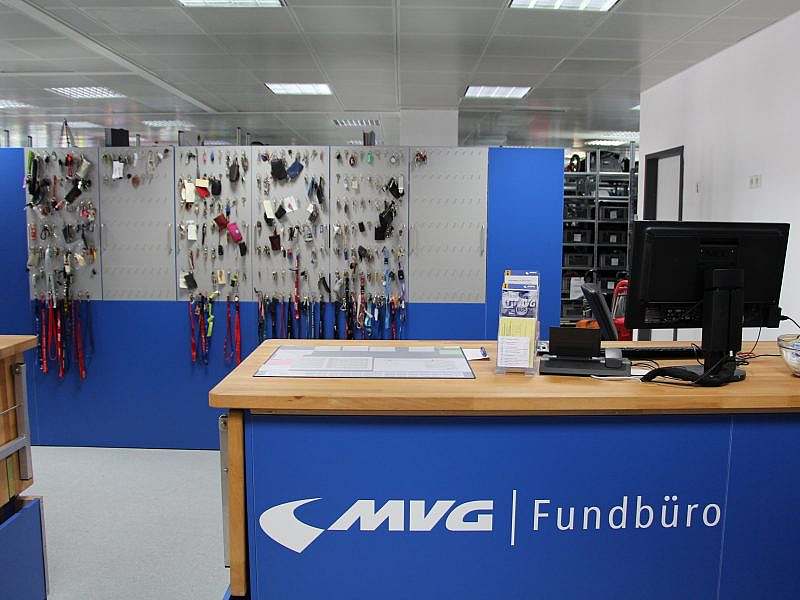 Counter, room divider with found keys in the background